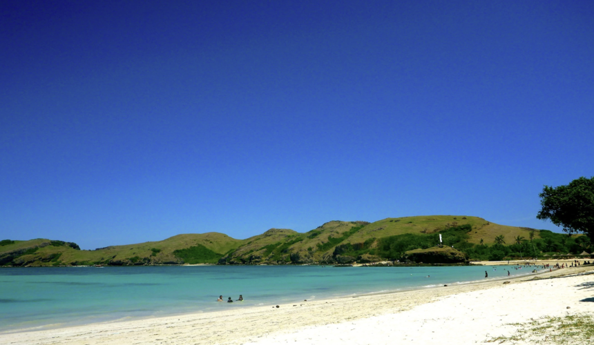Wide stretch of soft white sand at Tanjung Aan Beach, Lombok, Indonesia
