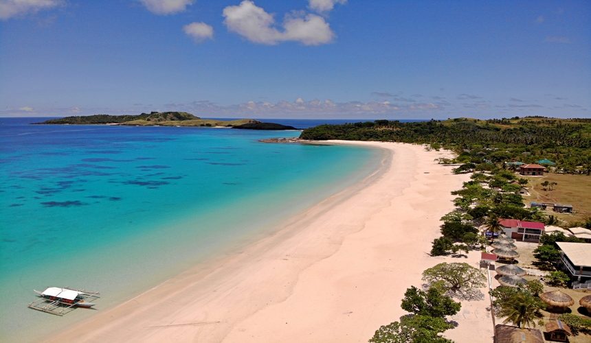 Unspoiled white sand beach on Calaguas Islands Philippines